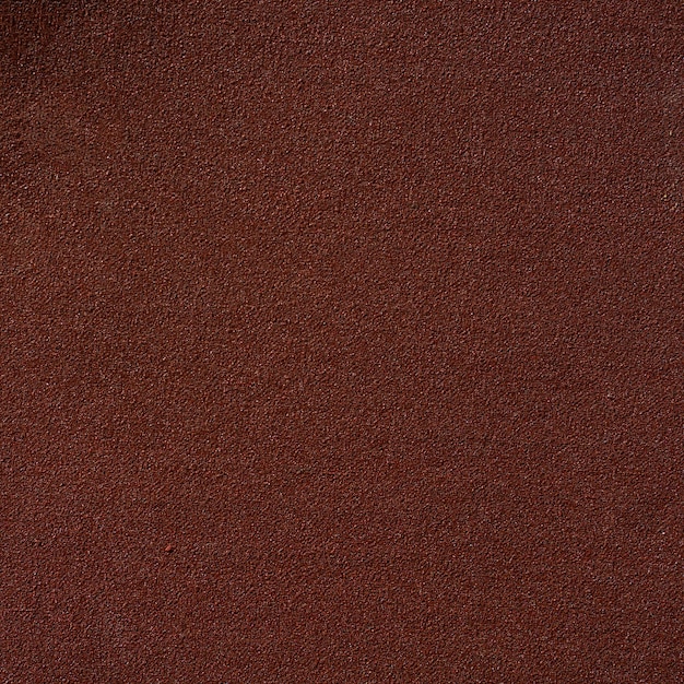 La texture brune du papier de verre pour fond de papier.