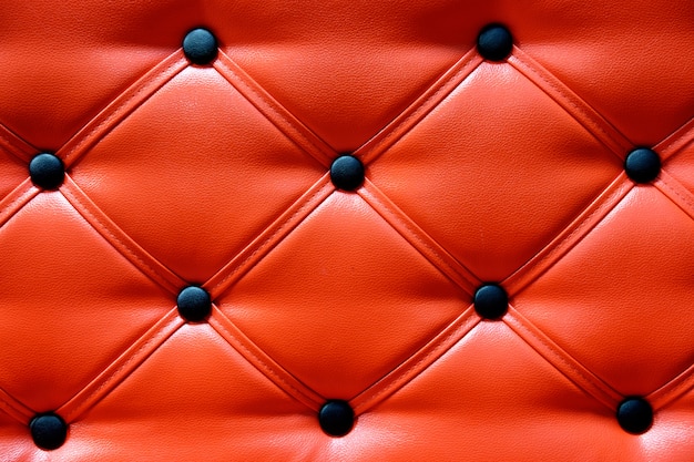 Texture de canapé en cuir rouge