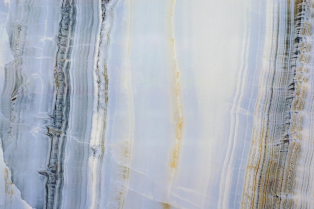 Texture de carreaux de marbre bleu avec fond de veines grises et dorées pour l'intérieur