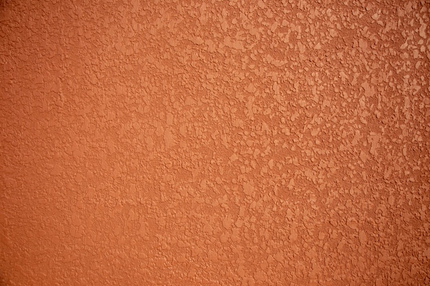 Texture de ciment rugueux orange pour papier peint