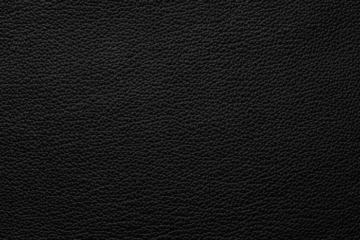 Photo texture de cuir noir surface de la peau comme fond sombre