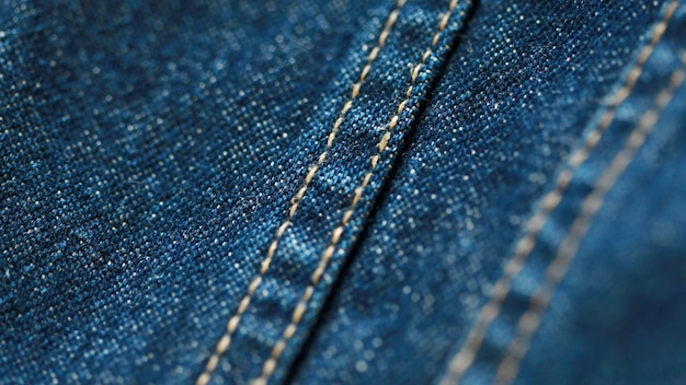 Texture de denim de jeans se bouchent, se concentrer sur un seul point, fond d'écran doux estompé