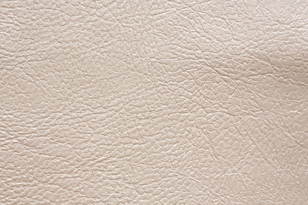 Texture de dermantine beige clair douce ordinaire sur macro