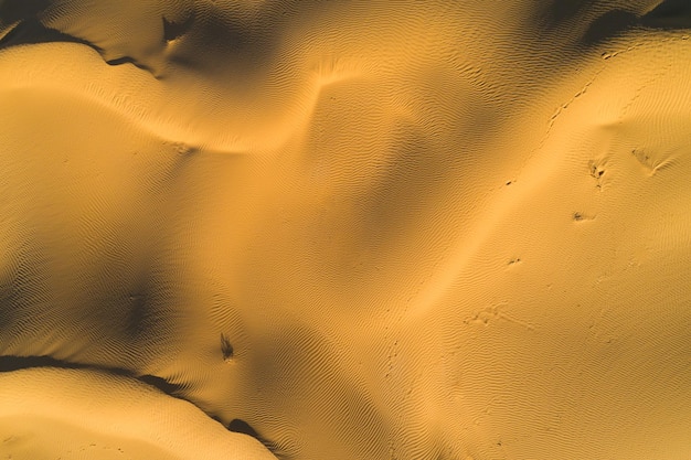 Texture du désert de sable. Lignes et motif. Prise de vue verticale en haut de l'antenne.