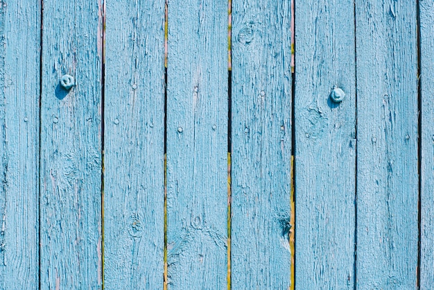 La texture du fond de planche de bois bleu