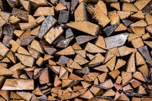 La texture du mur de bois de chauffage, après avoir scié du bois