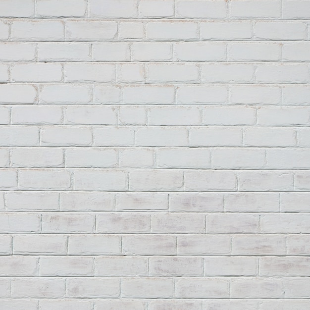 La texture du mur de brique, peint en blanc