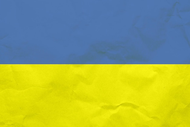 Texture du papier aux couleurs du drapeau jaune-bleu de l'Ukraine