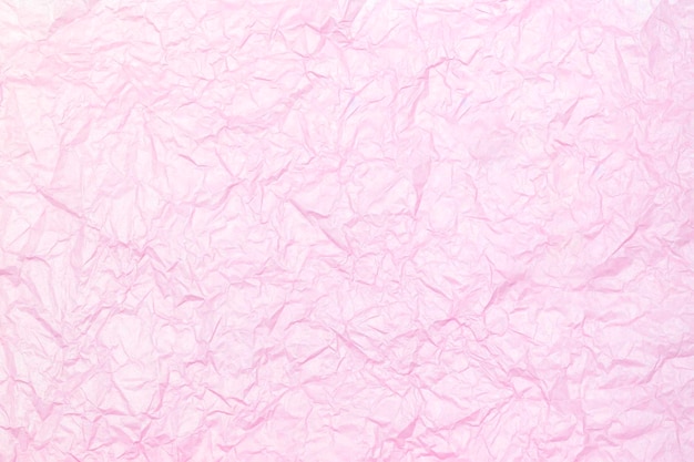 La texture du papier rose froissé Mise à plat