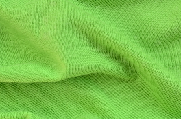 La Texture Du Tissu Est Vert Vif. Matériel Pour La Confection De Chemises Et De Chemisiers