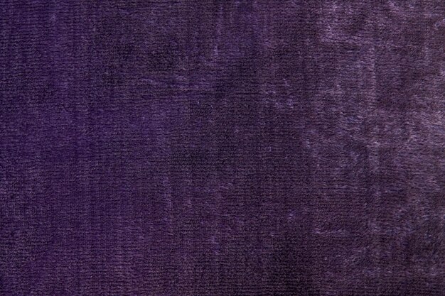 Photo texture du tissu texture du vieux tissu de velours violet foncé utilisé comme fond arrière-plan violet en gros plan texture de tissu blanc arrière-plan vue supérieure