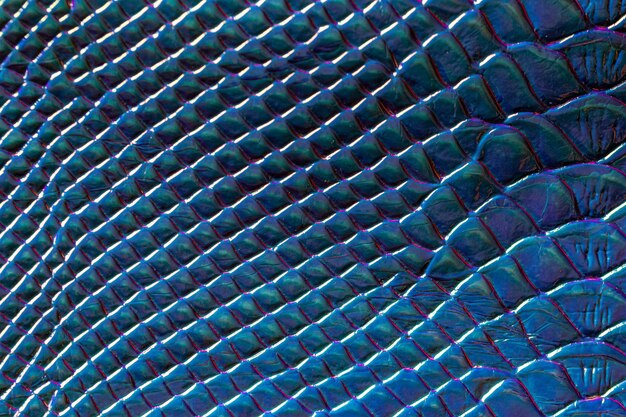 Une texture d'écailles de verre bleu