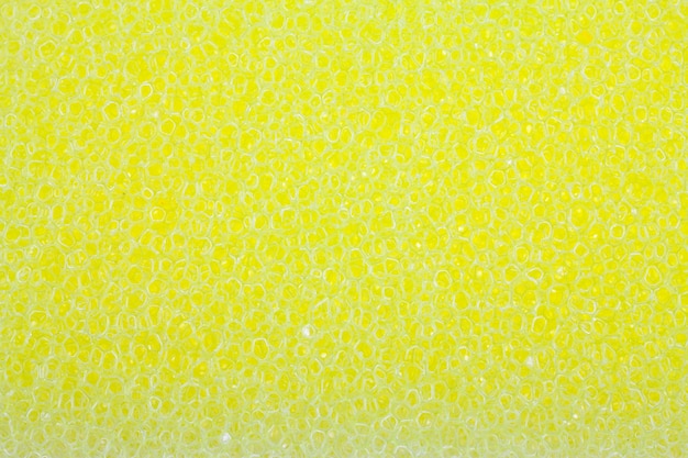 Photo texture éponge jaune.