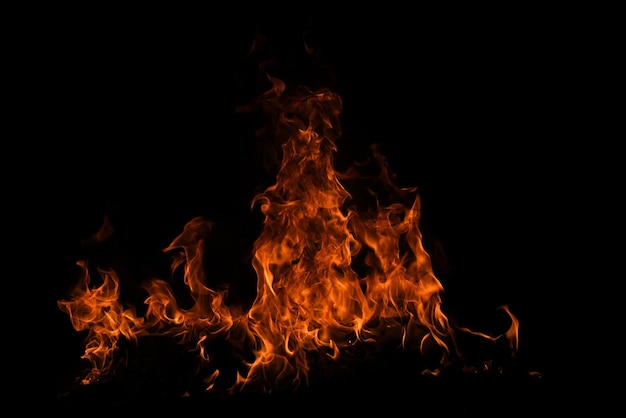 Texture de feu sur un fond noir abstrait feu flamme fond grand feu brûlant