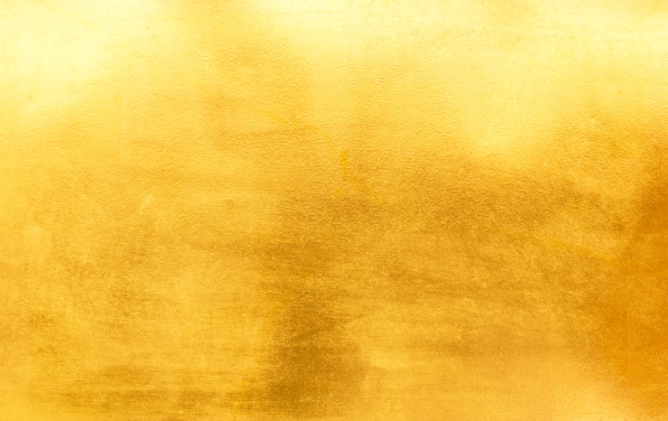Photo texture de feuille d'or jaune brillant