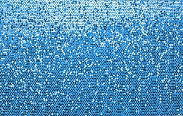 Photo texture de fond abstrait de dégradé de lumière motif paillettes bleu brillant