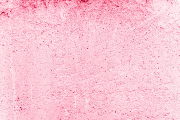 Texture de fond en béton de vieux mur de pierre de béton rose sale comme toile de fond surface de ciment gris grunge comme matériau de papier de structure gros plan tonique dans la couleur tendance viva magenta de l'année 2023