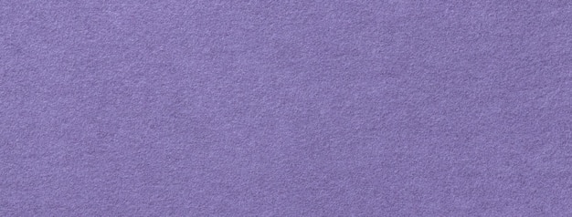 Photo texture de fond de couleur pourpre foncé à partir de matériau textile en feutre macro tissu violet vintage