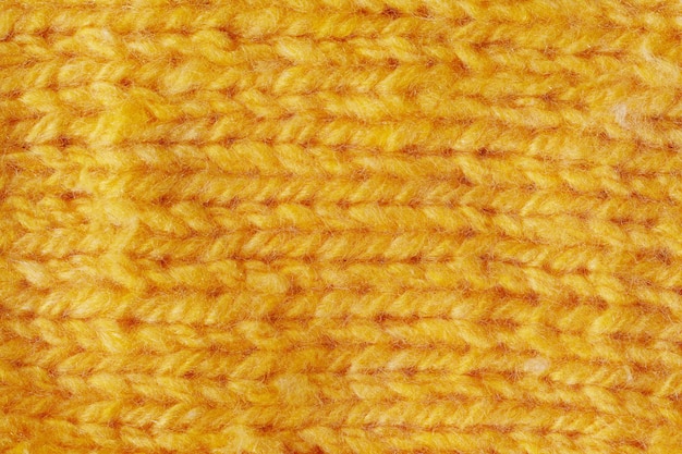 Texture de fond couture tricotée jaune