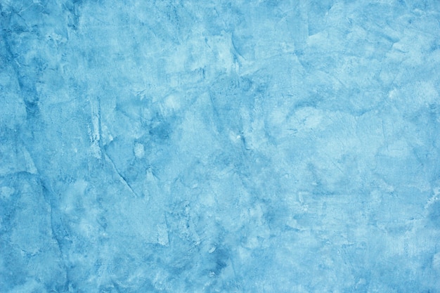 La texture de fond du plâtre de ciment est bleu brut.