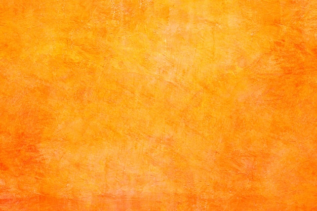 Texture de fond de mur de béton orange.