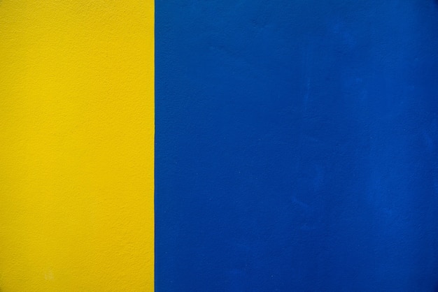 Texture de fond de mur bleu et jaune