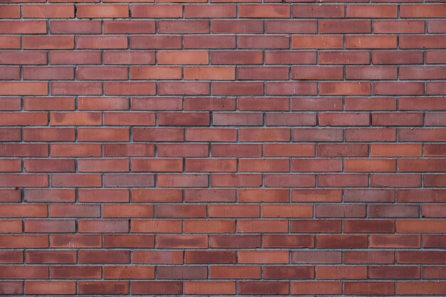 Texture de fond d'un mur de briques rouges