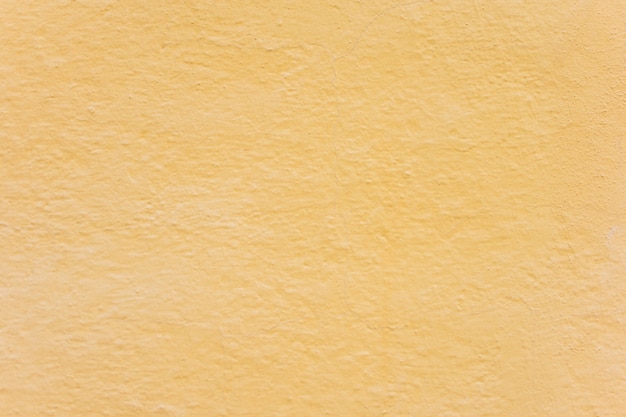 Texture de fond de mur jaune simple