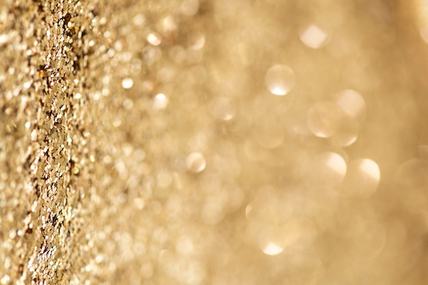 Texture de fond de paillettes d'or scintillant