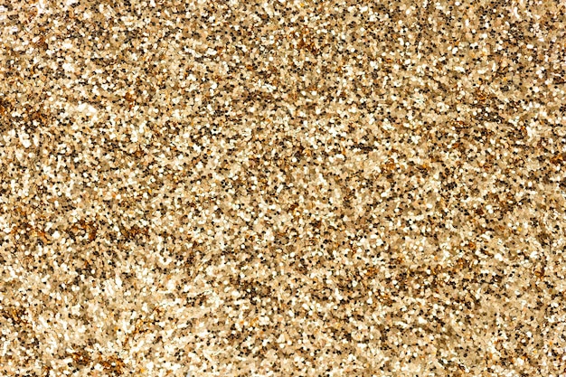 Texture de fond de paillettes d'or scintillant