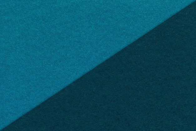 Texture de fond de papier artisanal bleu marine et turquoise moitié deux couleurs Vintage carton kraft foncé céruléen