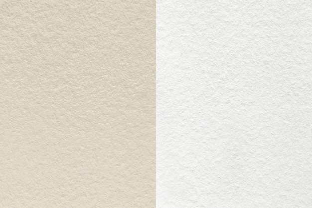 Texture de fond de papier beige et blanc artisanal moitié deux couleurs macro Structure de carton artisanal crème