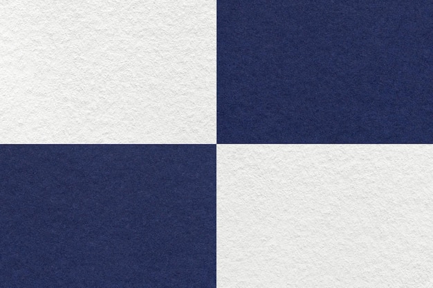 Texture de fond de papier blanc et bleu marine artisanal avec motif de cellules Structure de carton denim kraft vintage