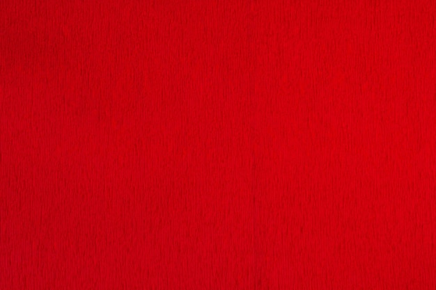Texture de fond de papier ondulé rouge