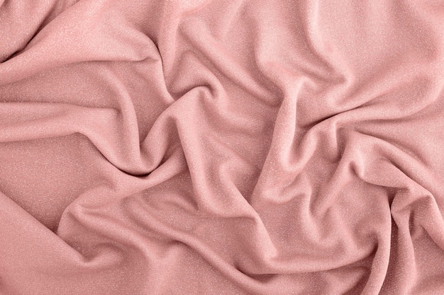 Texture de fond rose de laine tricotée. Tricot.