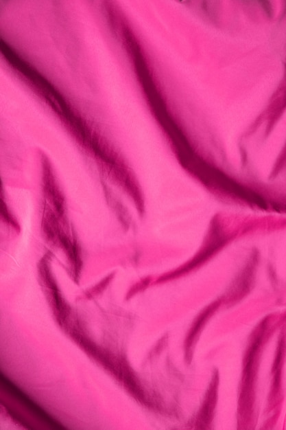 Texture de fond de satin rose