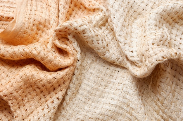 Texture de fond de tissu crème, beau gros plan de tissu