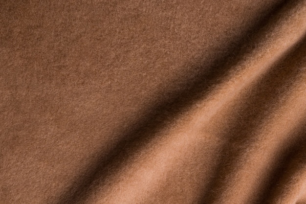 Texture de fond. Tissu en laine d'alpaga marron