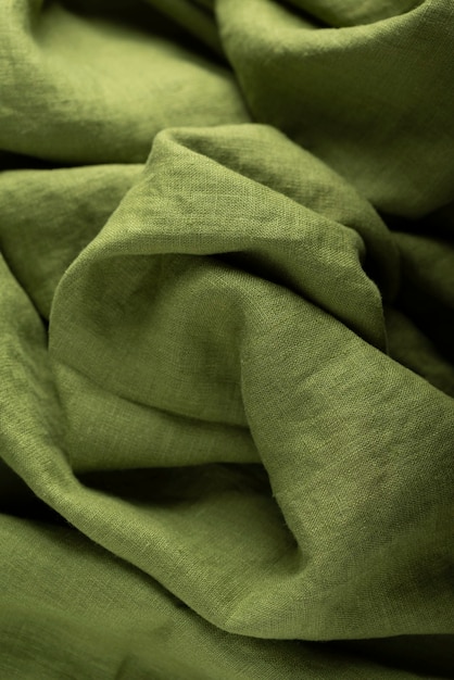 Texture de fond de tissu de lin de couleur verte. Notion de couture