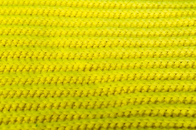 Texture et fond de tissu tricoté jaune