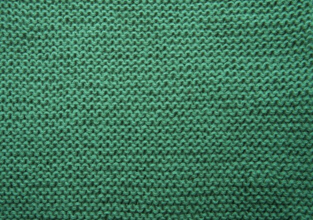 Texture de fond de tissu tricoté vert