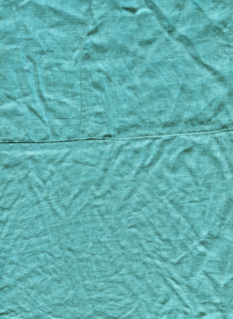 Texture de fond de tissu turquoise Fond turquoise à partir d'un matériau textile
