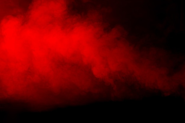 Texture fumée rouge sur fond noir