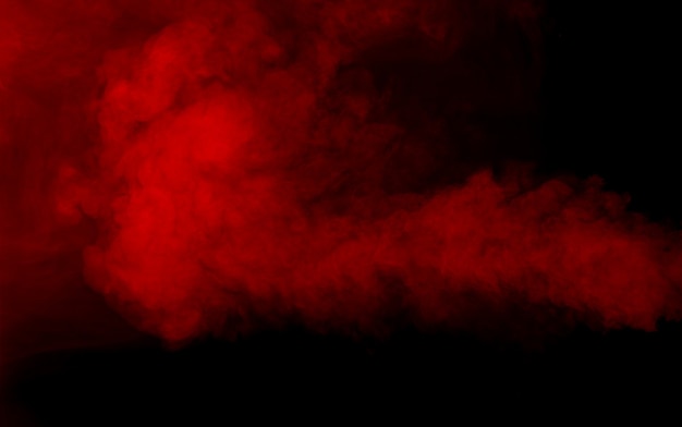 Texture de fumée rouge sur fond noir