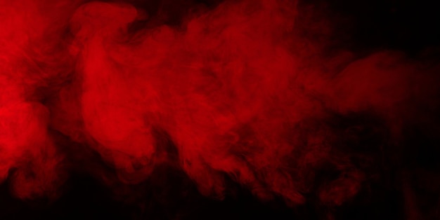 Texture de fumée rouge sur fond noir