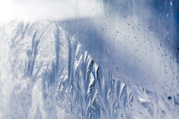Texture givrée. belle glace avec des fissures. surface de glace. photo de haute qualité