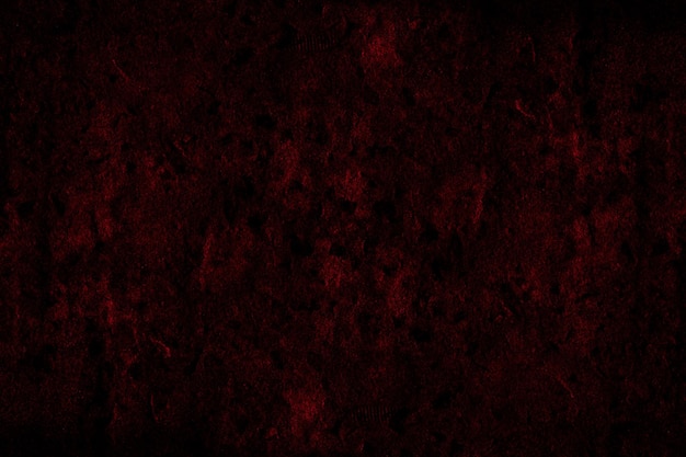 Texture grunge abstraite de surface en béton rouge foncé pour le fond