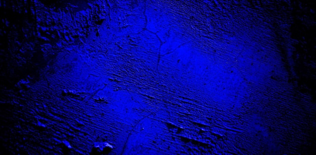 Texture grunge bleu foncé effrayant pour le concept d'horreur de mur bleu foncé de fond