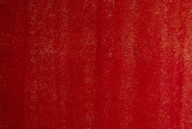 Texture horizontale de fond de mur en stuc rouge