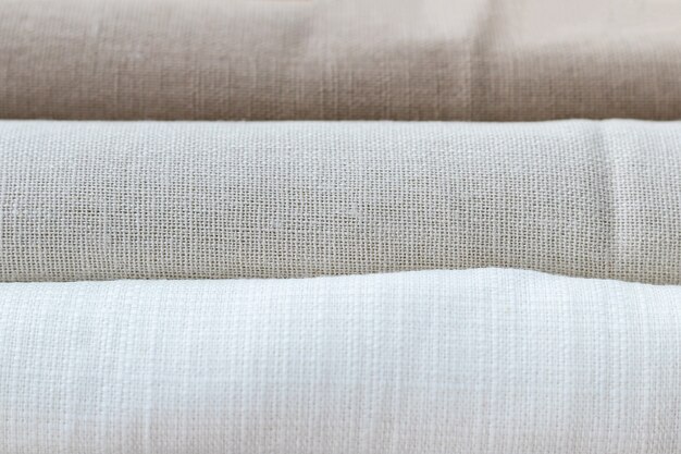 Texture horizontale de trois types de tissu en lin naturel